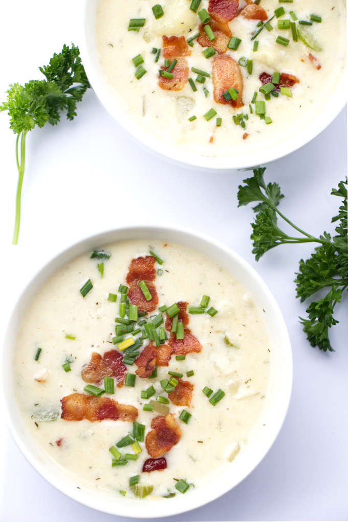 overhead photo of two bowls of clam chowder